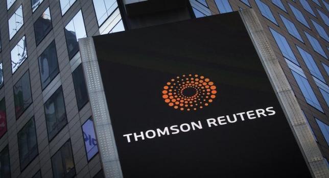 The Thomson Reuters logo is seen on the company building in Times Square, New York October 29, 2013. REUTERS/Carlo Allegri